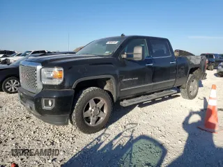 2015 GMC Sierra 2500HD Denali z VIN 1GT120E89FF153186, wystawiony jako Copart lot #88546105 z przebiegiem 418 972 mil mil oraz Czysty tytuł • Clean title. Historia ofert i sprzedaży dostępna na DreamBid. Obrazek 1.