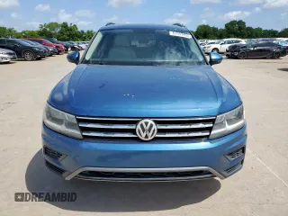 2018 Volkswagen Tiguan SEL z VIN 3VV3B7AX9JM191509, wystawiony jako Copart lot #61357405 z przebiegiem 209 934 mil mil oraz Czysty tytuł • Clean title. Historia ofert i sprzedaży dostępna na DreamBid. Obrazek 5.