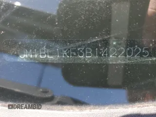 2011 Mazda 3 GX with VIN JM1BL1KF3B1422025, listed as a Copart auction lot 53072915 with 333,819 mi miles and Salvage Title. Bid and sale history available at DreamBid. Image 12.