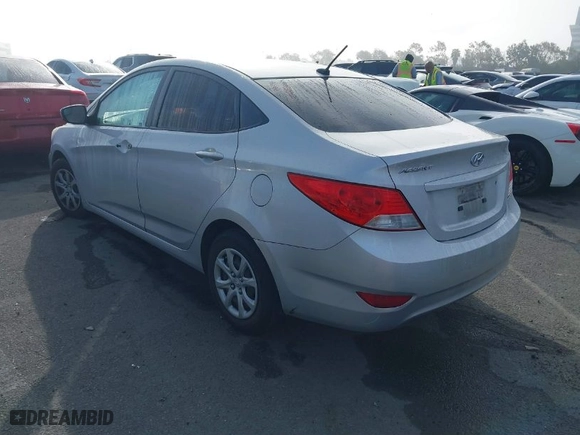 2014 Hyundai Accent GLS with VIN KMHCT4AE6EU586785, listed as a IAAI auction lot 41674060 with 135,355 mi miles. Bid and sale history available at carsss.com. Image 3.