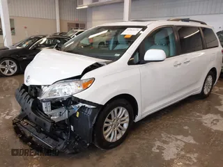 2014 Toyota Sienna XLE with VIN 5TDYK3DC5ES508021, listed as a IAAI auction lot 41963128 with 162,578 mi miles. Bid and sale history available at carsss.com. Image 19.