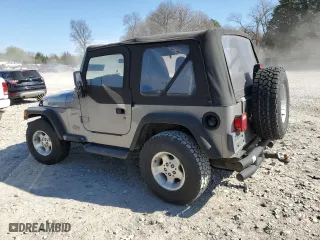 2000 Jeep Wrangler Sport with VIN 1J4FA49S4YP789348, listed as a Copart auction lot 50521365 with 0 mi miles and Salvage Title. Bid and sale history available at carsss.com. Image 2.