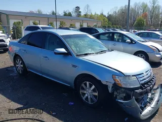 2008 Ford Taurus SEL with VIN 1FAHP24WX8G186437, listed as a IAAI auction lot 41934754 with 186,347 mi miles. Bid and sale history available at carsss.com. Image 1.