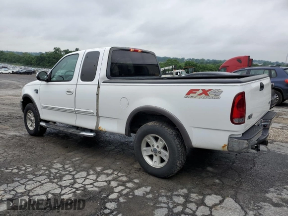 2003 Ford F-150 XL with VIN 1FTRX18L33NA43522, listed as a Copart auction lot 61197615 with 101,061 mi miles and Salvage title. Bid and sale history available at DreamBid. Image 2.