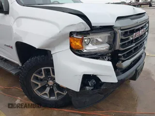 2021 GMC Canyon 4WD AT4 w/Leather with VIN 1GTG6FEN6M1154040, listed as a IAAI auction lot 41209527 with 29,484 mi miles. Bid and sale history available at carsss.com. Image 6.