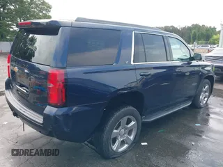 2018 Chevrolet Tahoe LT with VIN 1GNSKBKC7JR256937, listed as a IAAI auction lot 42614438 with 92,794 mi miles and . Bid and sale history available at DreamBid. Image 4.