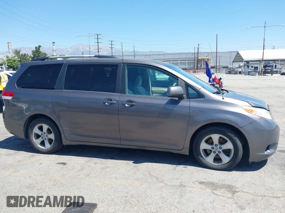 2011 Toyota Sienna LE AAS with VIN 5TDKK3DC4BS056872, listed as a IAAI auction lot 42643417 with 170,266 mi miles and . Bid and sale history available at DreamBid. Image 13.