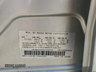 2004 Mazda 3 s with VIN JM1BK343741122704, listed as a Copart auction lot 53317435 with 214,688 mi miles and Salvage Title. Bid and sale history available at carsss.com. Image 14.