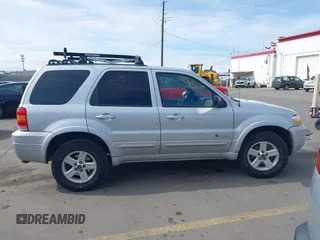 2006 Ford Escape Hybrid with VIN 1FMYU96H76KA14124, listed as a IAAI auction lot 42063449 with 53,055 mi miles and . Bid and sale history available at DreamBid. Image 13.