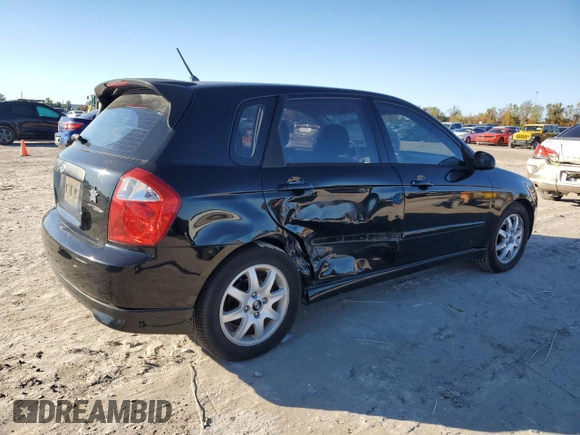2005 Kia Spectra with VIN KNAFE161355073968, listed as a Copart auction lot 84543784 with 166,858 mi miles and Salvage Title. Bid and sale history available at carsss.com. Image 3.