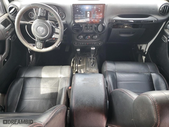 2012 Jeep Wrangler Unlimited Sahara with VIN 1C4BJWEG6CL256452, listed as a Copart auction lot 53305115 with 50,944 mi miles and Salvage Title. Bid and sale history available at carsss.com. Image 8.