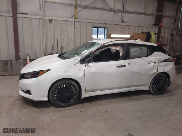 2023 Nissan LEAF SV PLUS with VIN 1N4CZ1CV0PC563256, listed as a IAAI auction lot 41138436 with NaN miles. Bid and sale history available at carsss.com. Image 14.