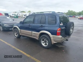 2001 Suzuki Grand Vitara JLX z VIN JS3TD62VX14165885, wystawiony jako IAAI lot #42091059 z przebiegiem 197 030 mil mil oraz . Historia ofert i sprzedaży dostępna na DreamBid. Obrazek 3.