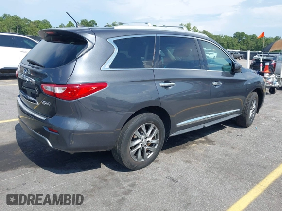 2014 Infiniti QX60 with VIN 5N1AL0MM6EC540477, listed as a IAAI auction lot 42791362 with 143,181 mi miles and . Bid and sale history available at DreamBid. Image 4.