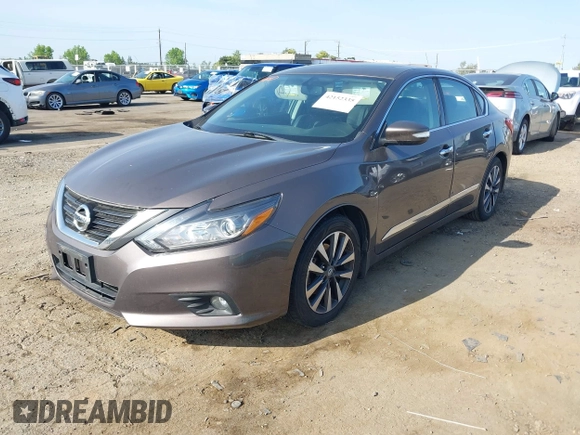 2016 Nissan Altima SR with VIN 1N4AL3AP8GC210448, listed as a IAAI auction lot 42152335 with 158,351 mi miles and . Bid and sale history available at carsss.com. Image 2.