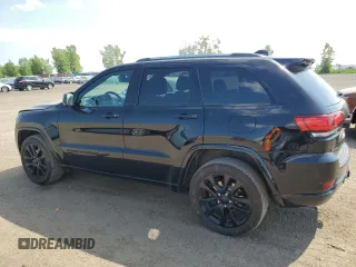 2019 Jeep Grand Cherokee Altitude with VIN 1C4RJFAG5KC813144, listed as a Copart auction lot 62295595 with 140,986 mi miles and Salvage title. Bid and sale history available at DreamBid. Image 2.