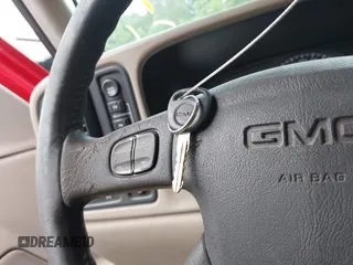 2003 GMC Sierra 1500 SLT z VIN 1GTEK19T33E199331, wystawiony jako IAAI lot #42062356 z przebiegiem 280 794 mil mil oraz . Historia ofert i sprzedaży dostępna na DreamBid. Obrazek 11.