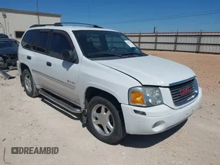 2006 GMC Envoy SLE with VIN 1GKDT13S562176779, listed as a IAAI auction lot 41831202 with 191,007 mi miles. Bid and sale history available at carsss.com. Image 1.