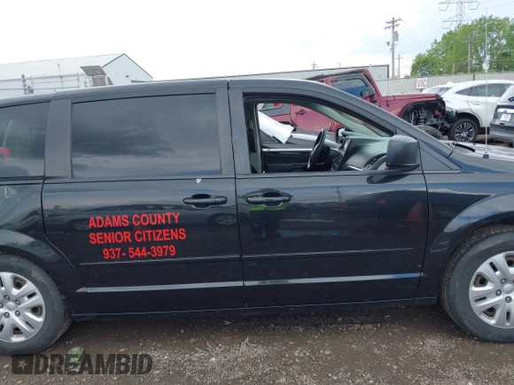 2017 Dodge Grand Caravan SE z VIN 2C4RDGBG0HR605507, wystawiony jako IAAI lot #42168499 z przebiegiem 169 422 mil mil oraz . Historia ofert i sprzedaży dostępna na DreamBid. Obrazek 13.