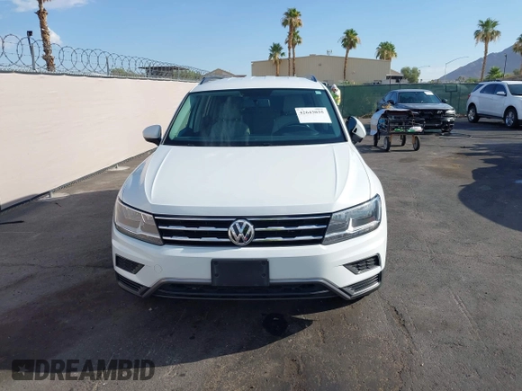 2020 Volkswagen Tiguan S with VIN 3VV1B7AXXLM036994, listed as a IAAI auction lot 42643035 with 62,676 mi miles and . Bid and sale history available at DreamBid. Image 12.