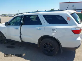 2013 Dodge Durango Crew with VIN 1C4RDJDG8DC664544, listed as a IAAI auction lot 42608957 with 202,564 mi miles and . Bid and sale history available at DreamBid. Image 14.