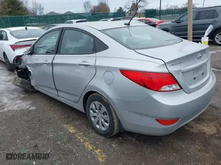 2016 Hyundai Accent SE with VIN KMHCT4AE1GU053634, listed as a IAAI auction lot 41427381 with 130,963 mi miles. Bid and sale history available at carsss.com. Image 3.