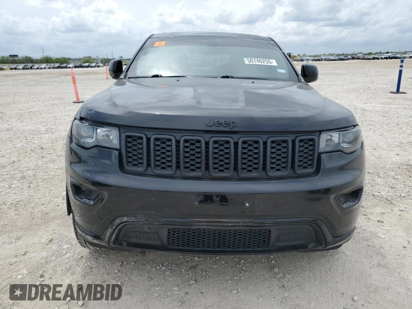 2018 Jeep Grand Cherokee Laredo E with VIN 1C4RJEAG4JC182430, listed as a Copart auction lot 50740255 with 117,944 mi miles and Salvage title. Bid and sale history available at DreamBid. Image 5.