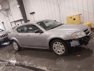 2014 Dodge Avenger SE z VIN 1C3CDZAB4EN228880, wystawiony jako IAAI lot #41605761 z przebiegiem 97 437 mil mil oraz . Historia ofert i sprzedaży dostępna na DreamBid. Obrazek 14.