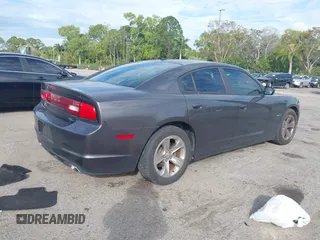 2013 Dodge Charger RT with VIN 2C3CDXCT1DH617932, listed as a IAAI auction lot 41359405 with 126,612 mi miles. Bid and sale history available at carsss.com. Image 4.