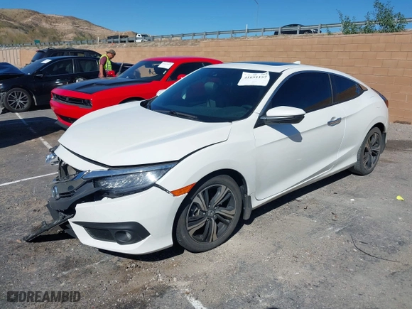 2017 Honda Civic Coupe Touring with VIN 2HGFC3B95HH356466, listed as a IAAI auction lot 41651157 with 100,940 mi miles. Bid and sale history available at carsss.com. Image 17.