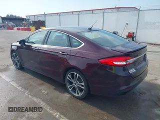 2017 Ford Fusion Titanium z VIN 3FA6P0K94HR271307, wystawiony jako IAAI lot #42595411 z przebiegiem 100 344 mil mil oraz . Historia ofert i sprzedaży dostępna na DreamBid. Obrazek 3.