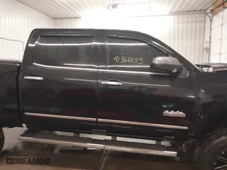 2015 Chevrolet Silverado 1500 High Country with VIN 3GCUKTEJXFG320011, listed as a IAAI auction lot 41366273 with 157,947 mi miles. Bid and sale history available at carsss.com. Image 13.