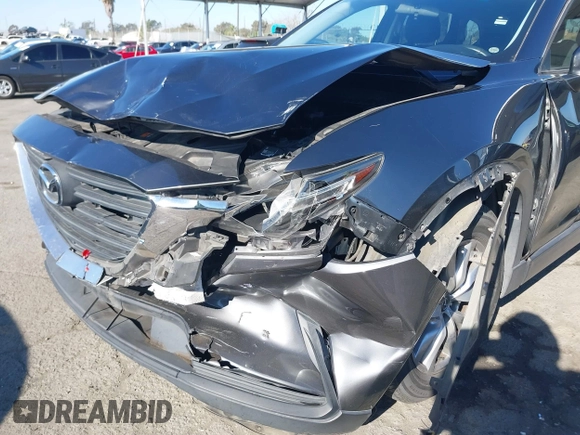 2017 Mazda CX-9 Sport with VIN JM3TCABY4H0128483, listed as a IAAI auction lot 41299667 with 142,343 mi miles and . Bid and sale history available at DreamBid. Image 6.