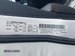 2014 Dodge Durango R/T with VIN 1C4SDHCT5EC590056, listed as a IAAI auction lot 42469695 with 174,356 mi miles and . Bid and sale history available at DreamBid. Image 9.
