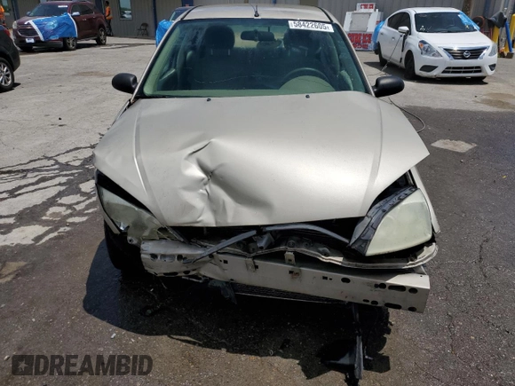 2006 Ford Focus S z VIN 1FAFP34N46W154378, wystawiony jako Copart lot #58422605 z przebiegiem Nie podano mil oraz Szkoda całkowita • Salvage title. Historia ofert i sprzedaży dostępna na DreamBid. Obrazek 5.