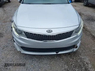 2016 Kia Optima EX z VIN 5XXGU4L36GG070336, wystawiony jako IAAI lot #41259692 z przebiegiem 124 807 mil mil oraz . Historia ofert i sprzedaży dostępna na DreamBid. Obrazek 12.
