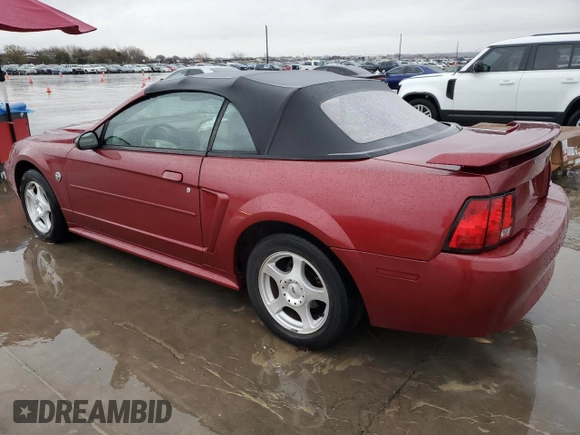 2004 Ford Mustang Deluxe с VIN 1FAFP444X4F112744, выставлен на аукционе Copart как лот 86508014 с пробегом 131 560 миль миль и Списание • Salvage title. История ставок и продаж доступна на DreamBid. Изображение 2.