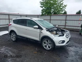 2019 Ford Escape Titanium with VIN 1FMCU9J97KUA06551, listed as a IAAI auction lot 42281534 with 69,151 mi miles and . Bid and sale history available at DreamBid. Image 1.