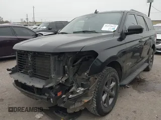 2021 Ford Expedition XL with VIN 1FMJU1FT5MEA84000, listed as a IAAI auction lot 41273172 with 77,049 mi miles. Bid and sale history available at carsss.com. Image 2.