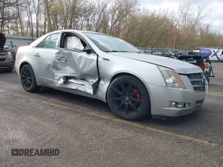 2009 Cadillac CTS AWD z VIN 1G6DH577X90135559, wystawiony jako IAAI lot #42077850 z przebiegiem 175 345 mil mil oraz . Historia ofert i sprzedaży dostępna na DreamBid. Obrazek 1.