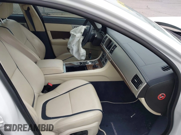 2014 Jaguar XF SC with VIN SAJWA0EX0E8U09381, listed as a IAAI auction lot 41783386 with 27,730 mi miles and . Bid and sale history available at DreamBid. Image 5.