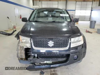 2012 Suzuki Grand Vitara Premium z VIN JS3TD0D66C4100814, wystawiony jako Copart lot #89250025 z przebiegiem 102 381 mil mil oraz Szkody całkowita. Historia ofert i sprzedaży dostępna na DreamBid. Obrazek 5.