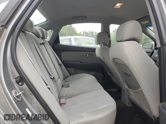 2009 Hyundai Elantra SE z VIN KMHDU46D49U807467, wystawiony jako Copart lot #58783865 z przebiegiem 118 110 mil mil oraz Czysty tytuł • Clean title. Historia ofert i sprzedaży dostępna na DreamBid. Obrazek 10.