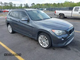 2014 BMW X1 sDrive28i with VIN WBAVM1C52EVW56134, listed as a IAAI auction lot 41941829 with 85,839 mi miles. Bid and sale history available at carsss.com. Image 1.