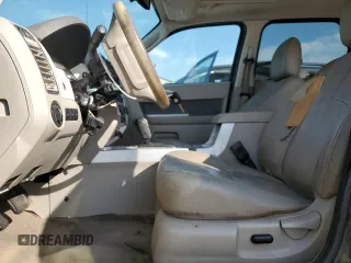 2011 Mercury Mariner Premier with VIN 4M2CN8HG7BKJ02153, listed as a Copart auction lot 66749194 with 0 mi miles and Salvage Title. Bid and sale history available at carsss.com. Image 7.