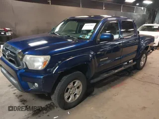 2014 Toyota Tacoma with VIN 3TMLU4EN4EM156933, listed as a IAAI auction lot 41197904 with 128,183 mi miles. Bid and sale history available at carsss.com. Image 17.
