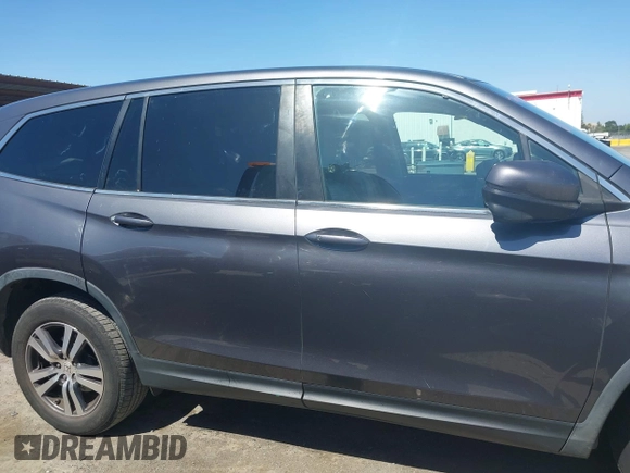 2017 Honda Pilot EX-L with VIN 5FNYF6H59HB032480, listed as a IAAI auction lot 42488789 with 112,595 mi miles and . Bid and sale history available at DreamBid. Image 13.