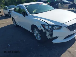 2014 Mazda 6 i Sport with VIN JM1GJ1U58E1105376, listed as a IAAI auction lot 42024402 with 124,233 mi miles. Bid and sale history available at carsss.com. Image 6.