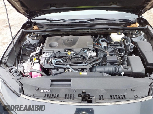 2025 Toyota Camry LE z VIN 4T1DAACK0SU057646, wystawiony jako IAAI lot #42147253 z przebiegiem 6 675 mil mil oraz . Historia ofert i sprzedaży dostępna na DreamBid. Obrazek 10.