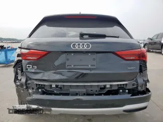 2021 Audi Q3 Premium z VIN WA1AUCF33M1058867, wystawiony jako Copart lot #56708705 z przebiegiem 55 658 mil mil oraz Szkoda całkowita • Salvage title. Historia ofert i sprzedaży dostępna na DreamBid. Obrazek 6.